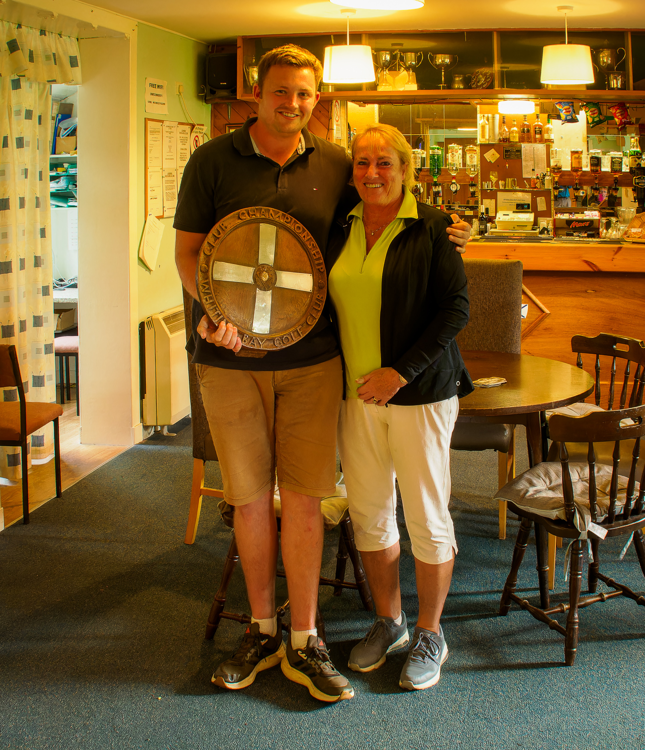 2023 WBGC Gents Champion Danny Head with the champion's shield he has just received from club captain, Doreen Mainds